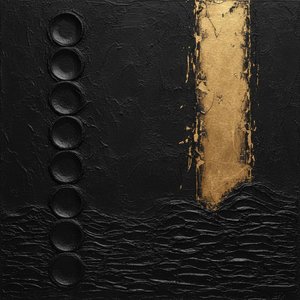 Gilded Erosion Over Sculpted Obsidian Voids