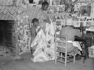 Sewing a quilt. Gees Bend, Alabama [Lucy Mooney]