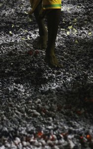 Poo midhi or Thee midhi is another sacrifice in which devotees run across hot coal