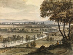 River landscape with a town in the distance
