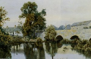 A Stone Bridge Leading Into Village