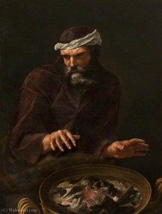 A bearded man warming his hands