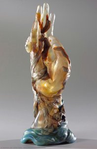 Hand with Seaweed and Shells