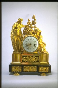 Mantel clock with a priestess and Cupid offering a sacriffice to Venus