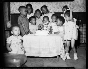 John Nelson Jr. Licking Birthday Cake Icing Off Of Knife, Surrounded By Boys And Girls, At Birthday Party In Nelson Home, 2224 Tustin Street, Hill District — Charles Harris
