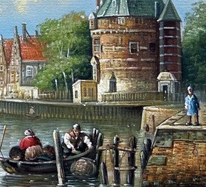 Moored Sailing Vessels Near The Hoofdtoren Of Hoorn