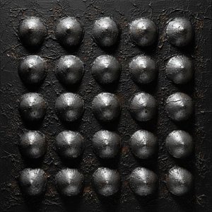 Monolithic Silver Orbs Amidst The Shadowed Rhythms Of Oxidized Basalt Texture — David Moreau