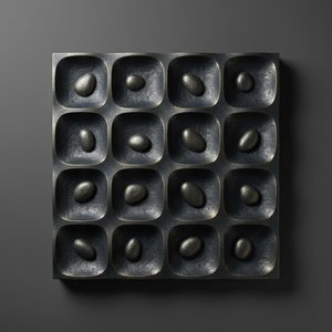 Monolithic Symmetry: A Meditative Study Of Obsidian Forms And Shadowed Grids — David Moreau