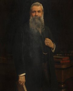 Portrait Of A Gentleman In His Library — John Maler Collier