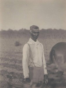 Man In White Shirt In Field — Doris Ulmann