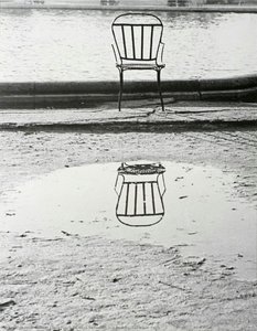 Chairs Reflected In A Puddle, Tuileries, Paris — Robert Louis Frank