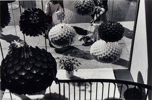 Untitled (paper Lamps, Window View Of Woman Walking Dog) — Burk Uzzle