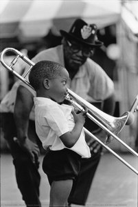 Trombone Shorty on stage with Bo Diddley, New Orleans Jazz and Heritage Festival