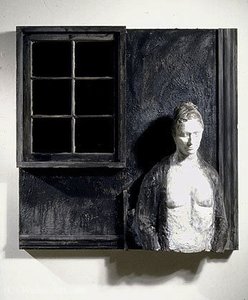 Women against black window