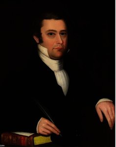 PORTRAIT OF A DARK-HAIRED GENTLEMAN WITH PEN AND BIBLE