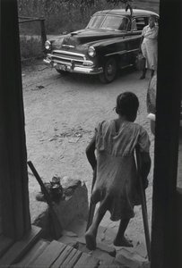Untitled (girl In Doorway; From Nurse Midwife Series) — William Eugene Smith