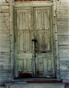Green Door, Newbern, Alabama — William Christenberry
