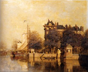Christaan karel moored sailing vessels along a quay amsterdam