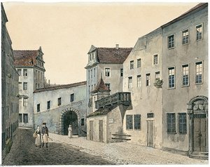 Couple On A Walk In A Altstadtgasse