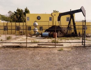 Ringler's Laundry, Fenced Oil Pump — Leland Rice