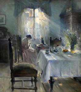 Woman sewing in an interior