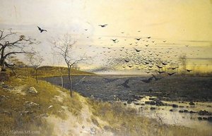 Flock of birds at sunset