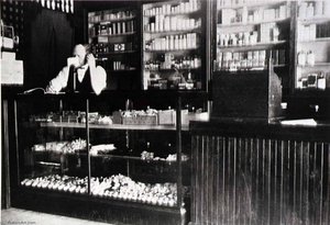 Ferguson Drug Store, 1218 35th Street (now Closed) Interior, Man On The Phone, 1940s, From The Corner Stores Of Galveston, Galveston County Cultural Arts Council — Betty Tichich