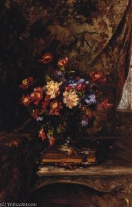 A Vase Of Mixed Flowers On A Book In An Interior