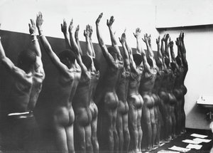 During Group Medical Examination, The Nude Men Are Herded Through A String Of Doctor’s Offices - Photographs From House Of Bondage, 1958-66 — Ernest Levi Tsoloane Cole