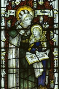 Stained glass panel showing St Anne teaching the Virgin Mary to read